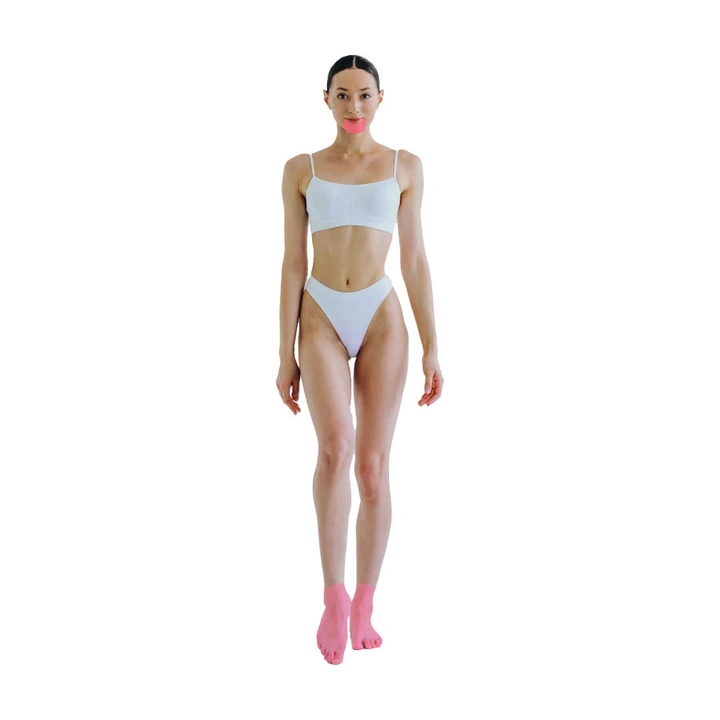 Demarcação da área feminina: Pés e dedos.